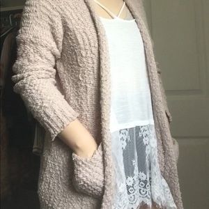 Popcorn, pastel mauve sweater